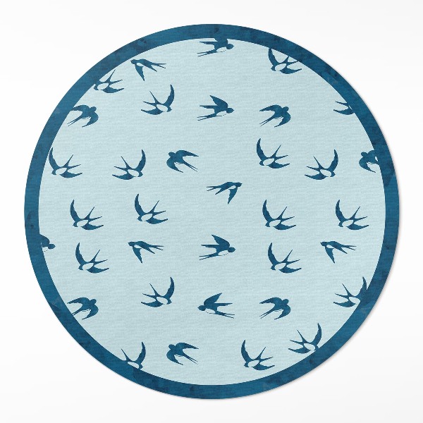 Kulatý vinylový koberec Malé lístky na modrém pozadí