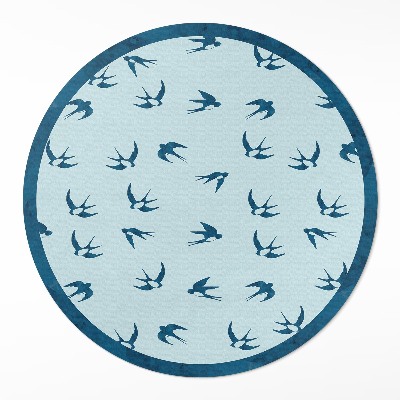 Kulatý vinylový koberec Malé lístky na modrém pozadí
