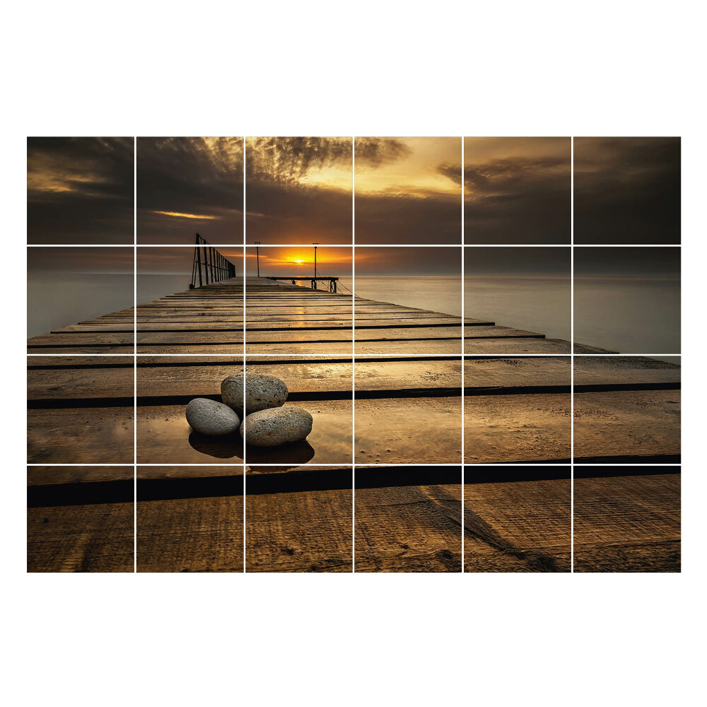 Samolepka na dlaždice Molo nad vodou při západu slunce