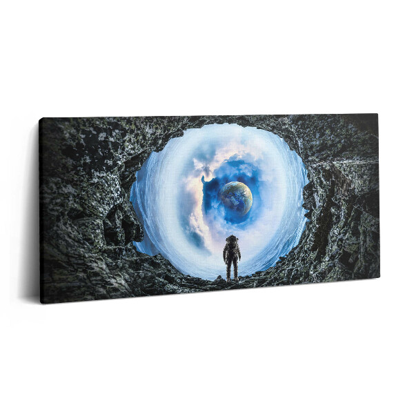 Obraz na plátně 100x50 cm Vesmírná díra a astronaut