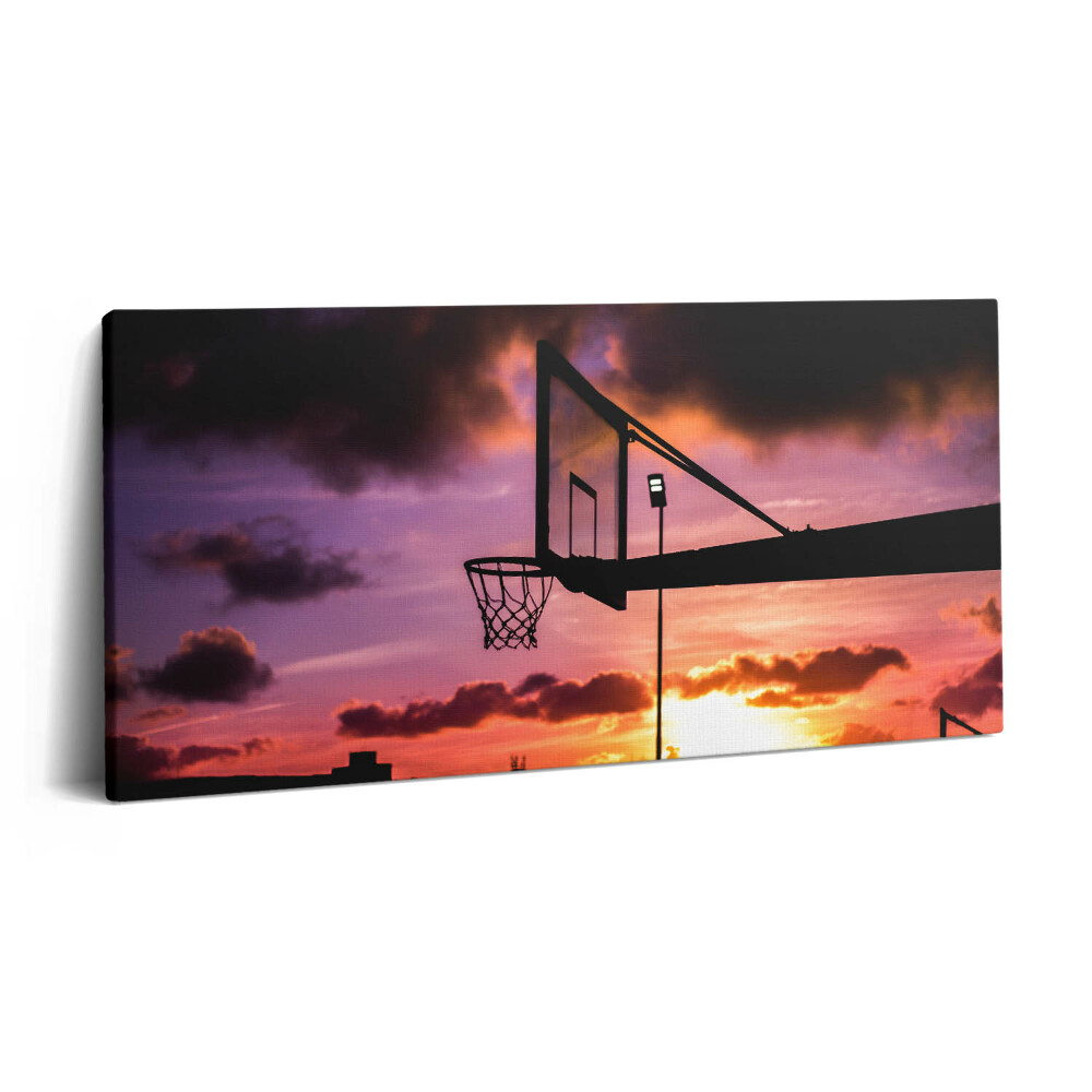 Obraz canvas 100x50 cm Basketbal a západ slunce