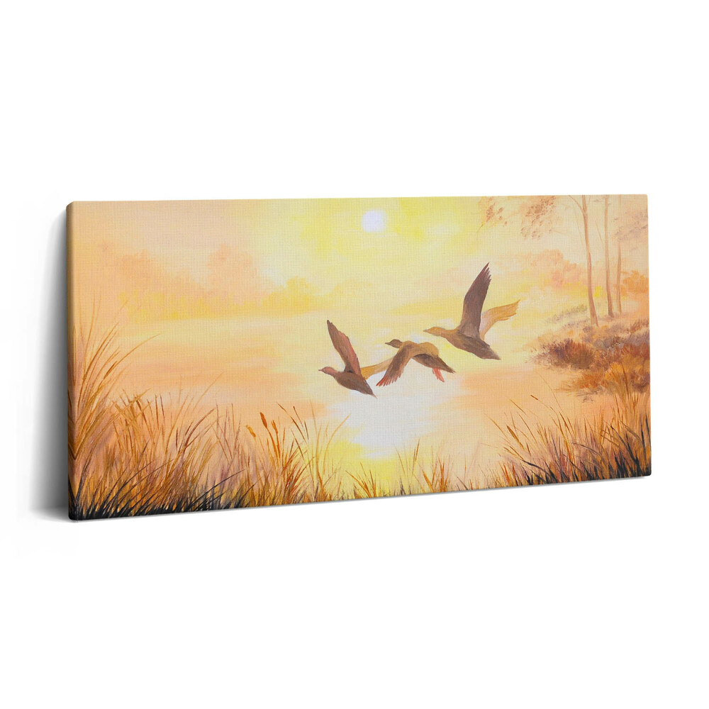 Obraz na plátně 120x60 cm Jeřábi při západu slunce