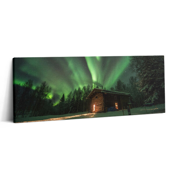 Obraz canvas 125x50 cm Polární záře a dům v lese