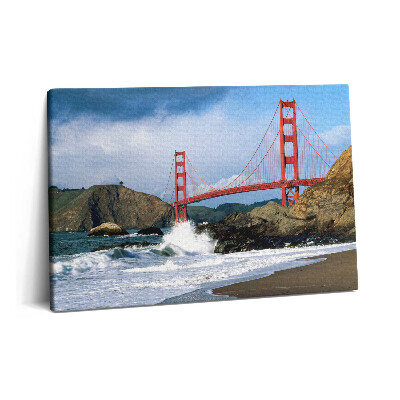 Obraz z fotografie na plátně 60x40 cm Vlny na mořském pobřeží a červený most