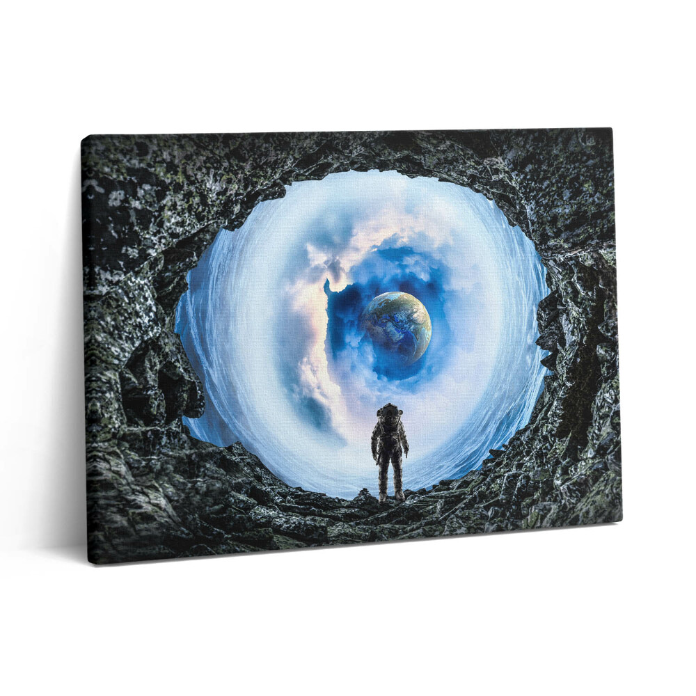 Obraz canvas 80x60 cm Vesmírná díra a astronaut