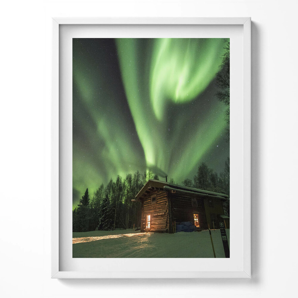 Obraz v rámu Polární záře a dům v lese