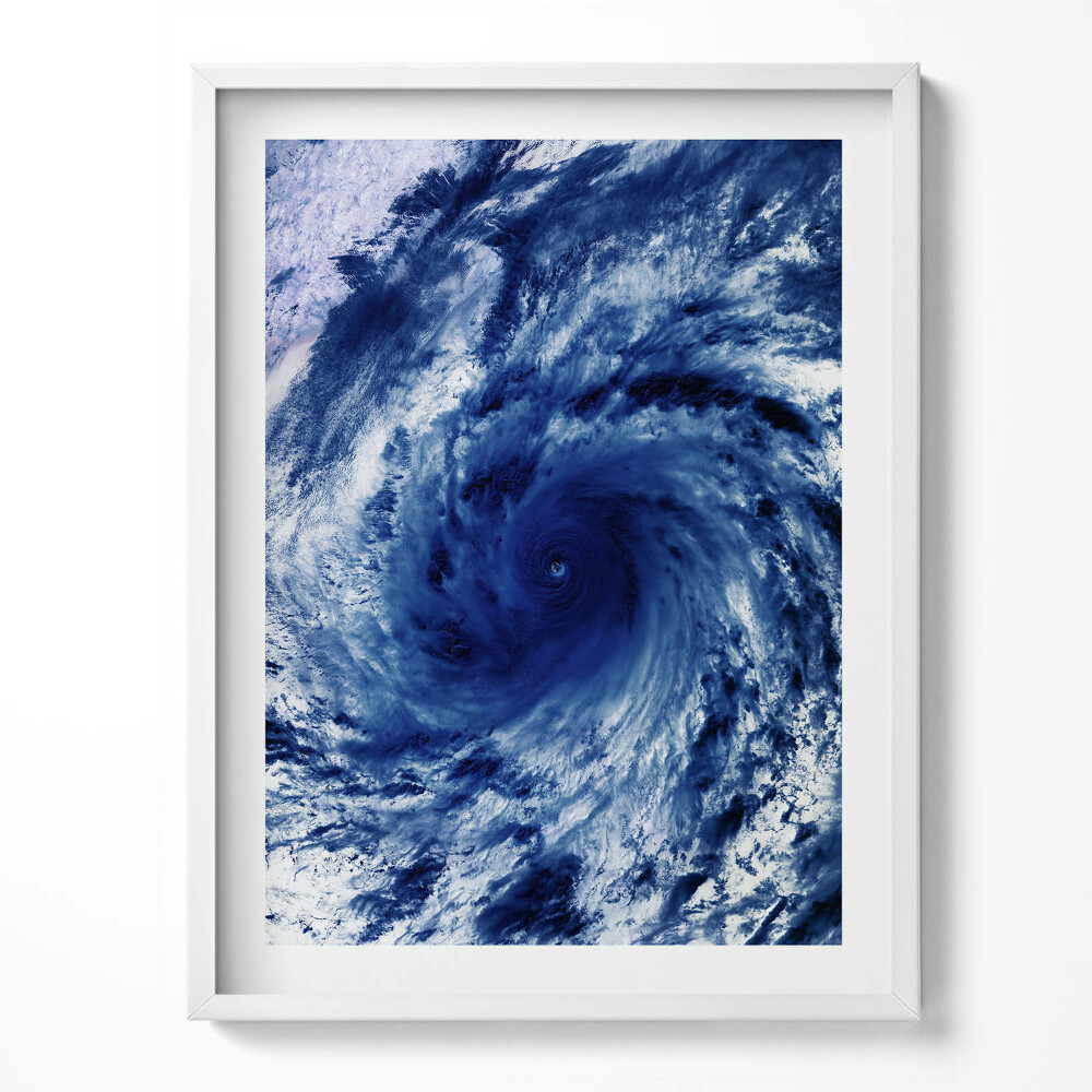 Obraz v rámu Foto NASA - cloudový vír z vesmíru