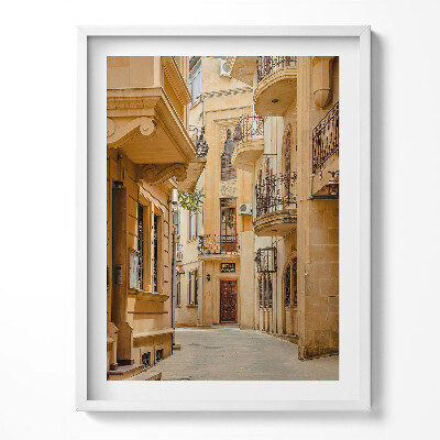 Obraz v rámu Úzká ulice mezi budovami