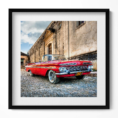 Obraz v rámu efektivní Červené staré auto v kolumbijské čtvrti