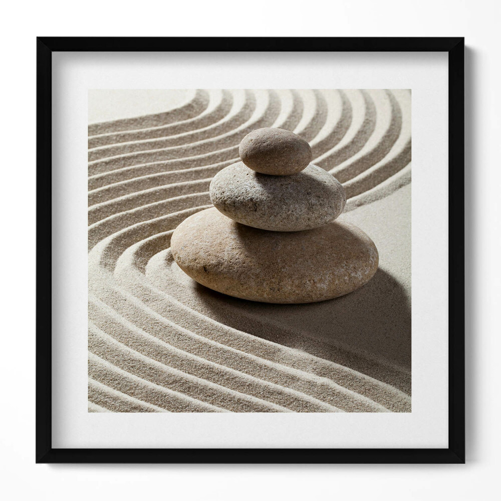 Obraz v rámu efektivní Hromada kamenů na zenovém písku