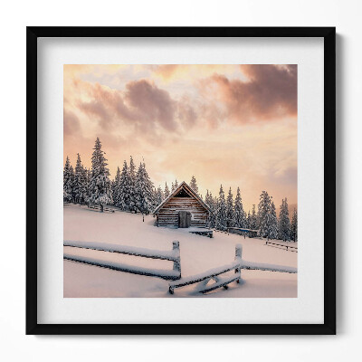Obraz v rámu efektivní Krajina horské chaty v zimě a při západu slunce