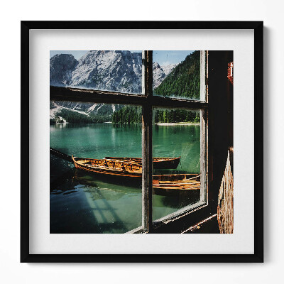 Obraz v rámu efektivní Pohled z okna na jezero s lodí