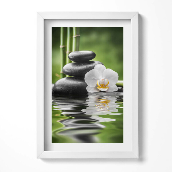 Obraz s rámem elegantní Zen - bambusové kameny a květina na vodě