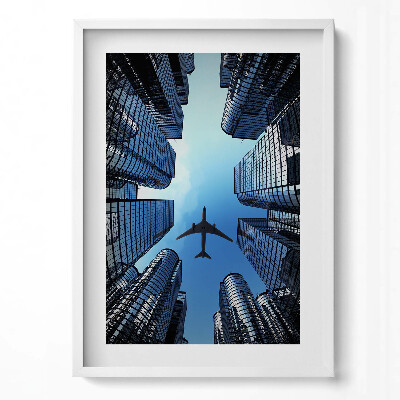 Obraz v rámu dekorativní Letadlo nad budovami