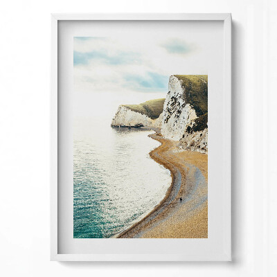 Obraz v rámu dekorativní Klidná pláž na úpatí útesů