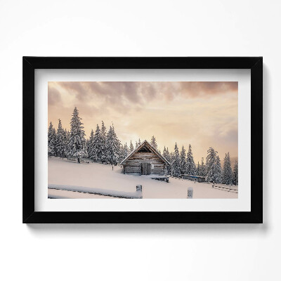 Obraz s rámem dekorativní Krajina horské chaty v zimě a při západu slunce