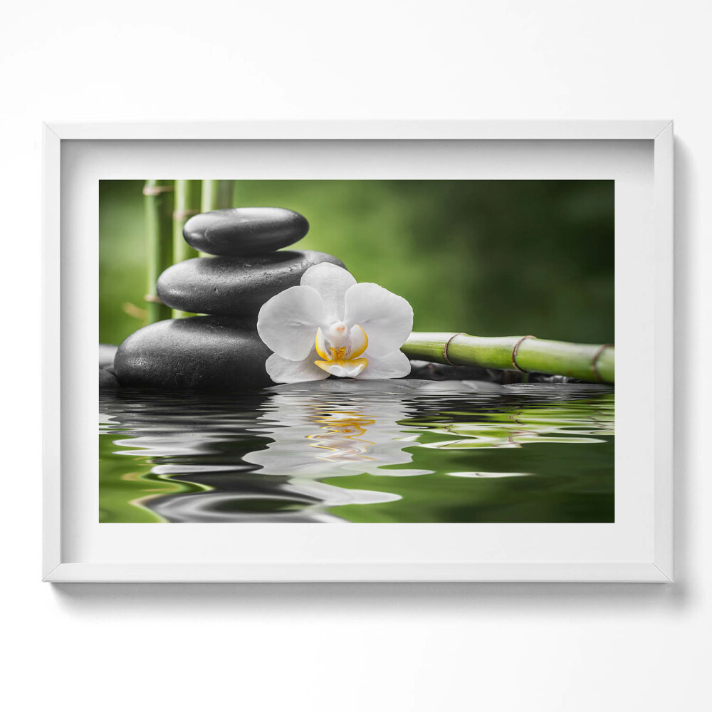 Obraz v rámu moderní Zen - bambusové kameny a květina na vodě