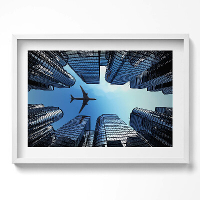 Obraz v rámu moderní Letadlo nad budovami