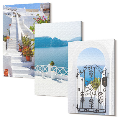 Sada 3 obrazů Bílé schody s rostlinami, výhledem na moře a bránou