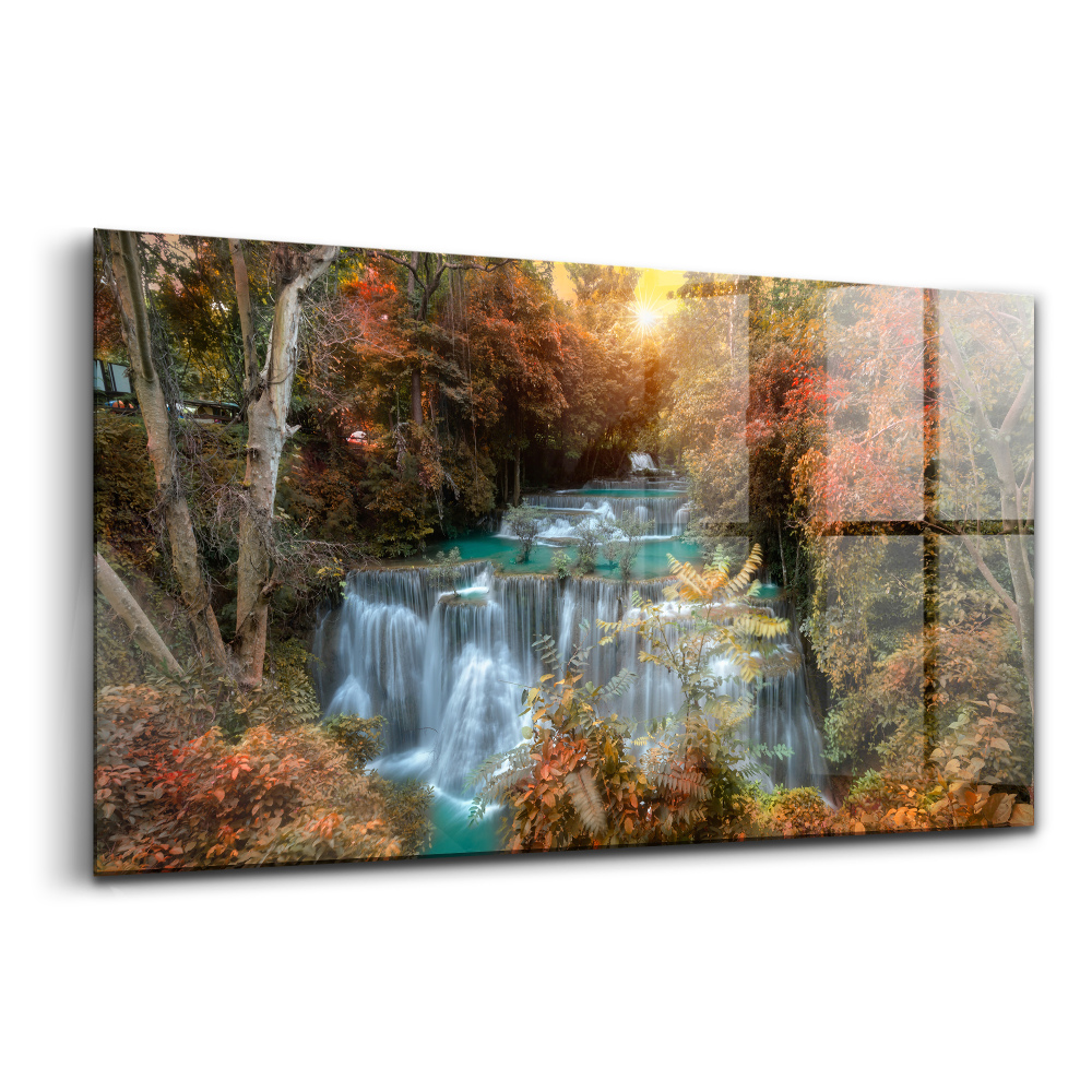Obraz na skle Západ slunce nad vodopádem