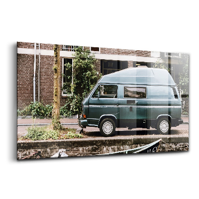 Skleněný obraz Dodávka u cihlových budov