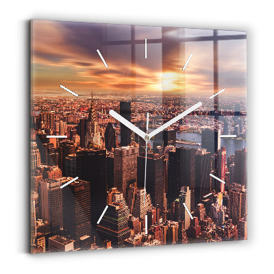 Skleněné hodiny na stěnu Panorama města na západ